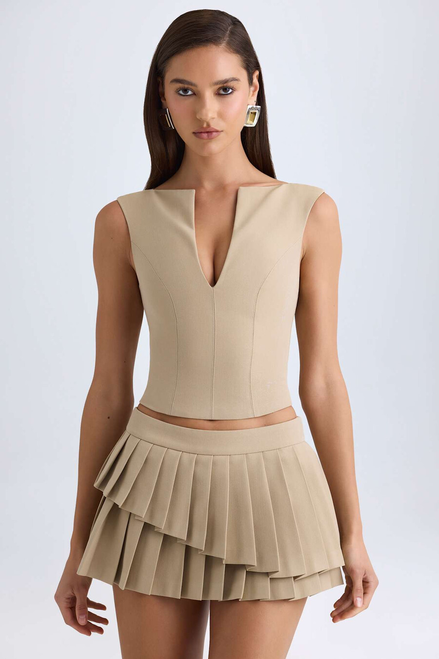 gelaagde geplooide minirok met lage taille in camelkleur