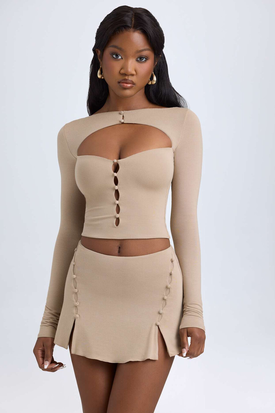 modal minirok met knoopdetails en lage taille in taupe