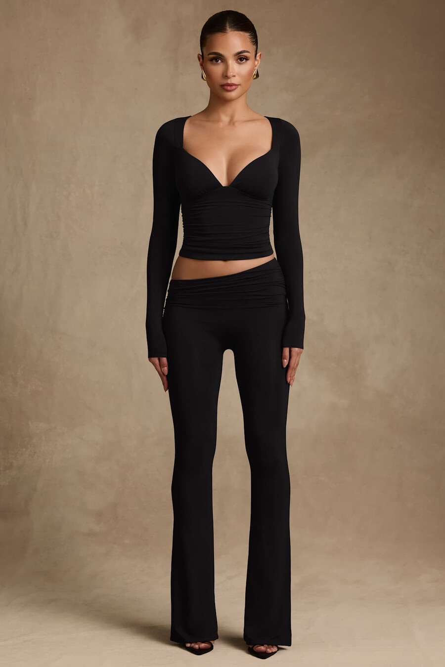 modal broek met asymmetrische taille en wijde pijpen in zwart