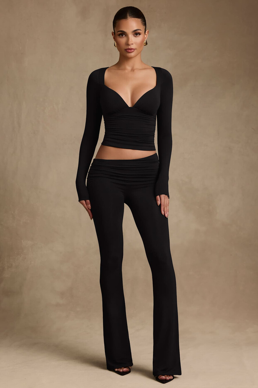 modal broek met asymmetrische taille en wijde pijpen in zwart