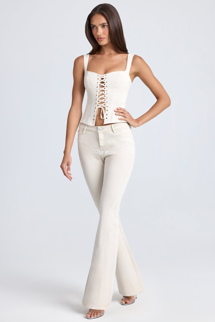 mid-rise flared jeans in ecru