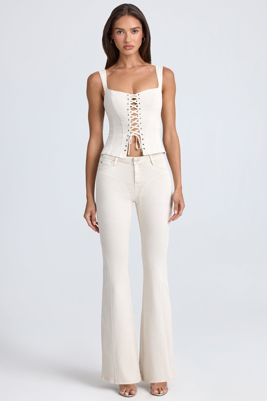 mid-rise flared jeans in ecru