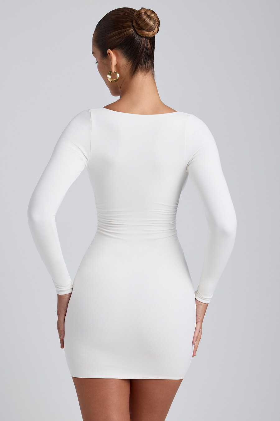 modal mini-jurk met lange mouwen en plooien in wit