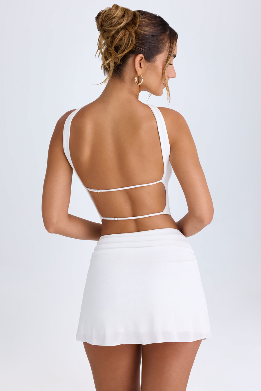 geplooide minirok met middelhoge taille in wit