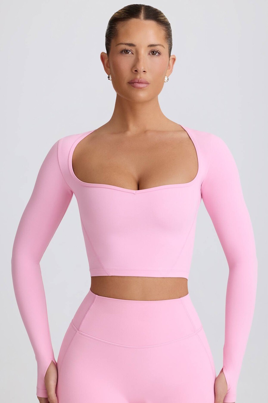zachte sportieve crop top met sweetheart-halslijn in babyroze.