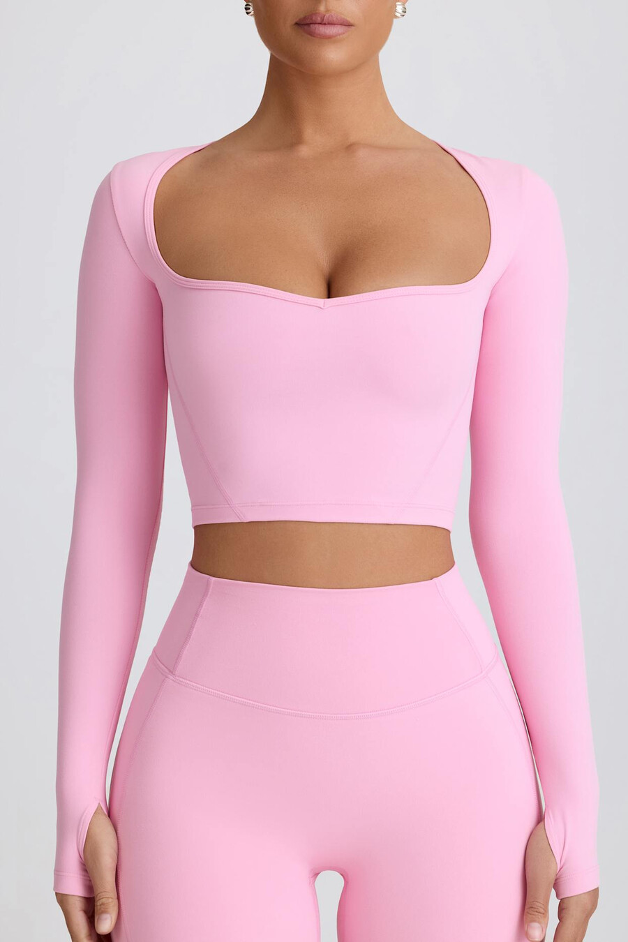 zachte sportieve crop top met sweetheart-halslijn in babyroze.