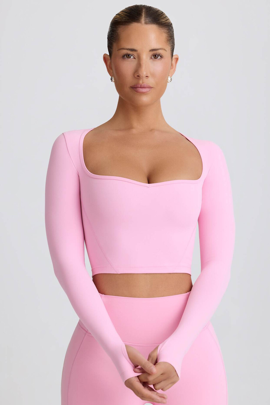 zachte sportieve crop top met sweetheart-halslijn in babyroze.