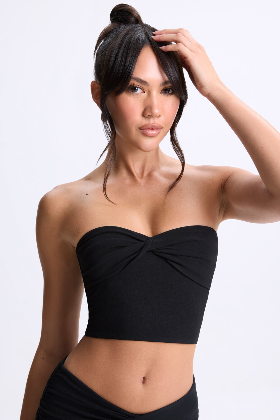 bandeau-top met gedraaide voorkant in zwart