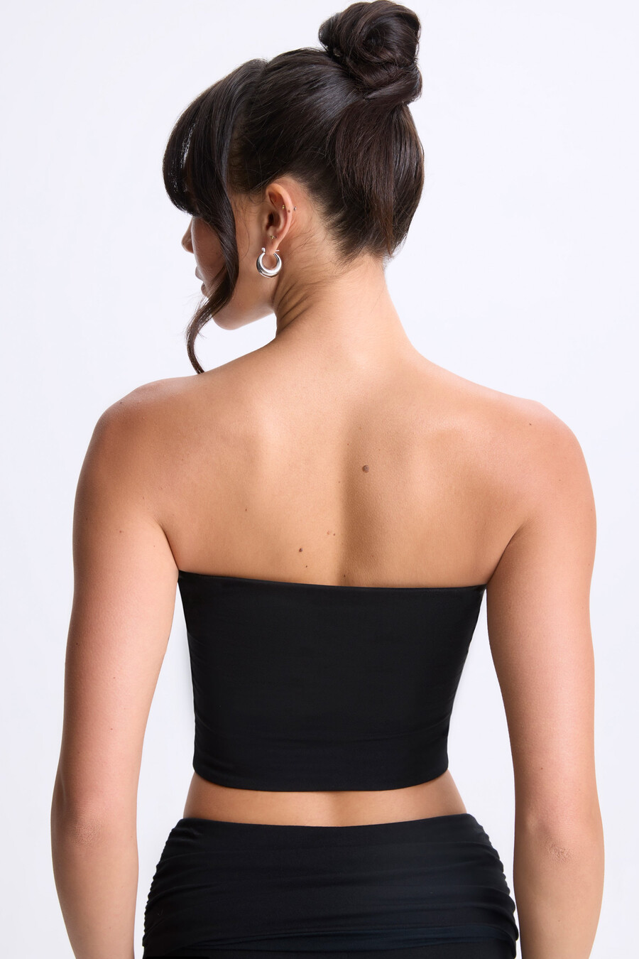 bandeau-top met gedraaide voorkant in zwart