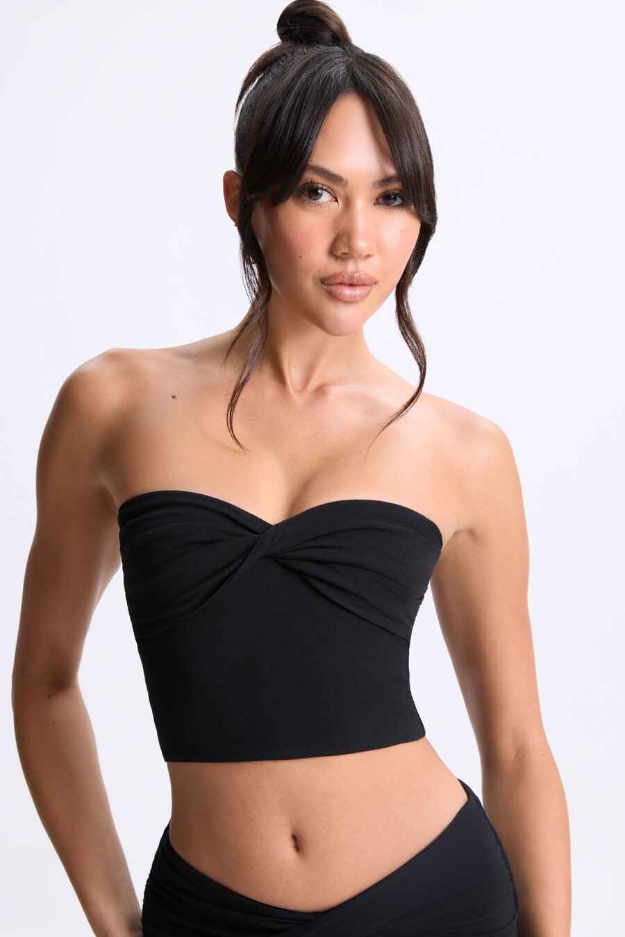 bandeau-top met gedraaide voorkant in zwart