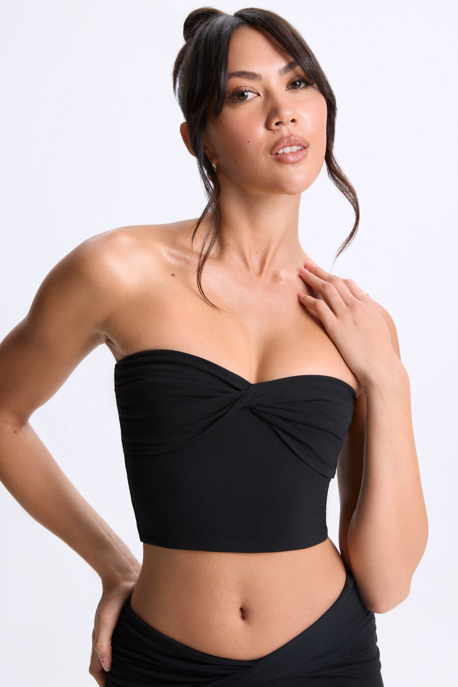 bandeau-top met gedraaide voorkant in zwart