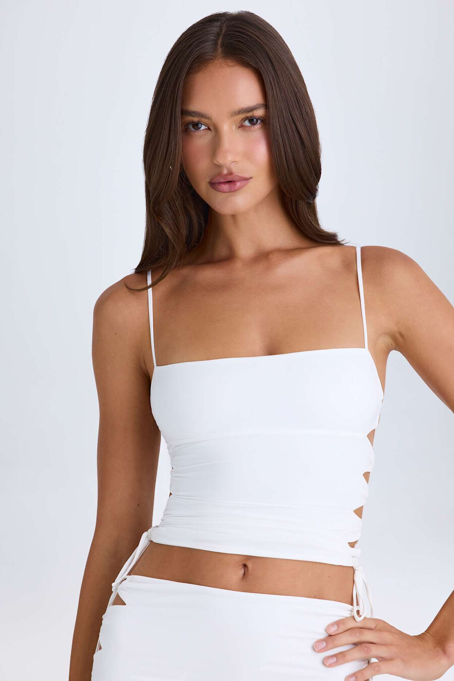 geplooide top met uitsnijdingen in wit
